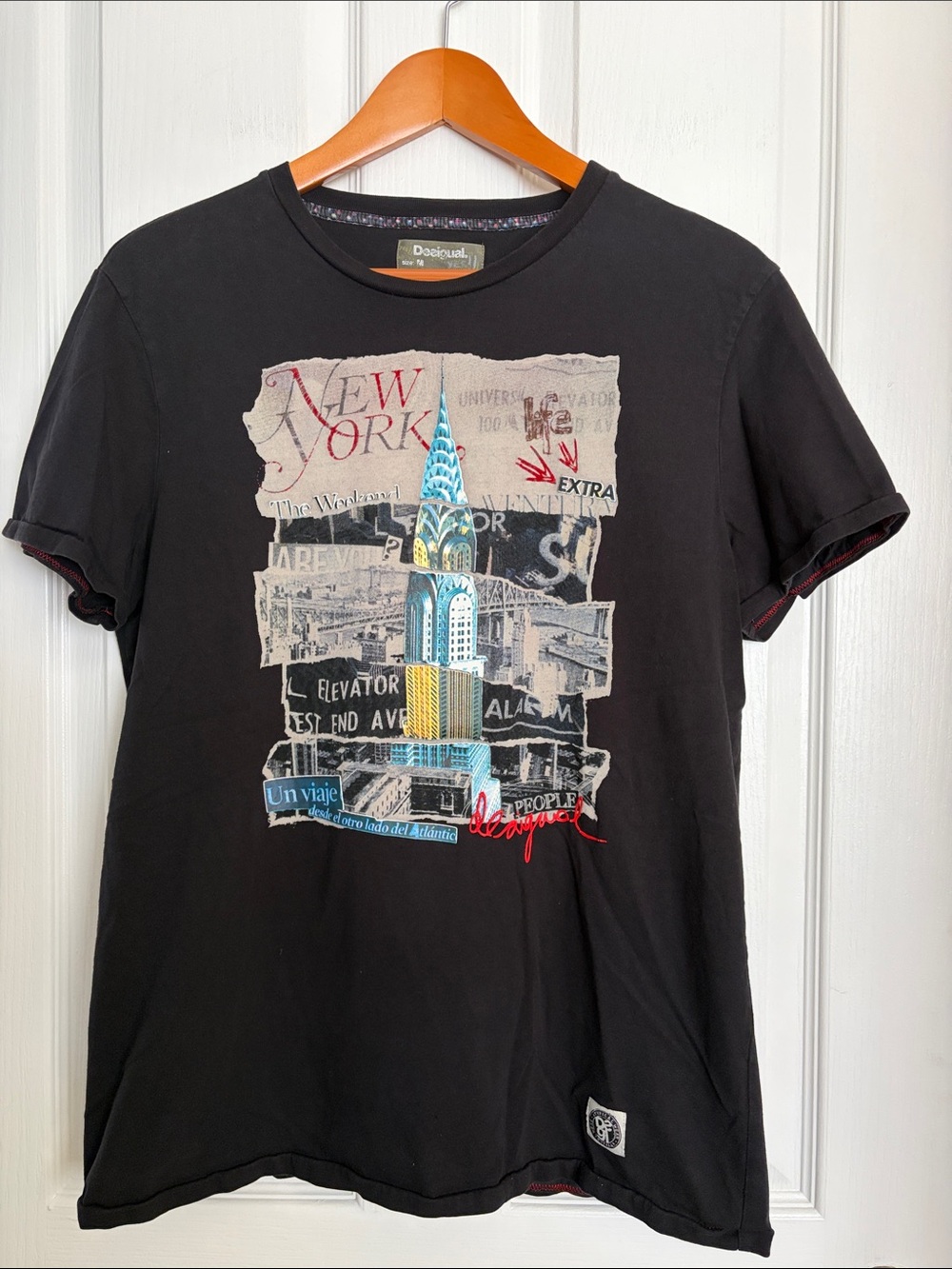 Desigual - Black New York City Graphic.  Raised rubber elements.